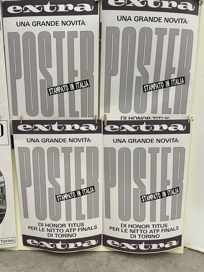 The smallest typeface on these posters is , a deliberately imperfect version of ; “extra” is set in .