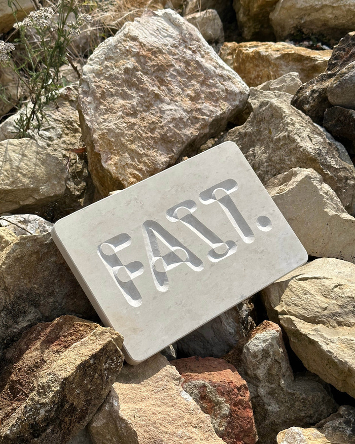 “Fait.” stone carving 1