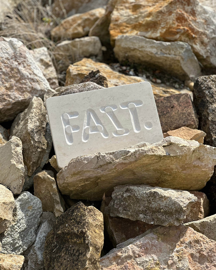 “Fait.” stone carving 5