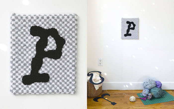 P set in  (designed by  and co-released by  and ) at 880 pt on a PNG Pale Gray and Paper White background