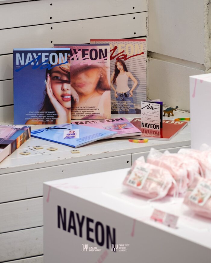 Merchandise from Nayeon's pop-up store in Seoul for the special collection “Nayeon x bloomingtale x oddoneout”