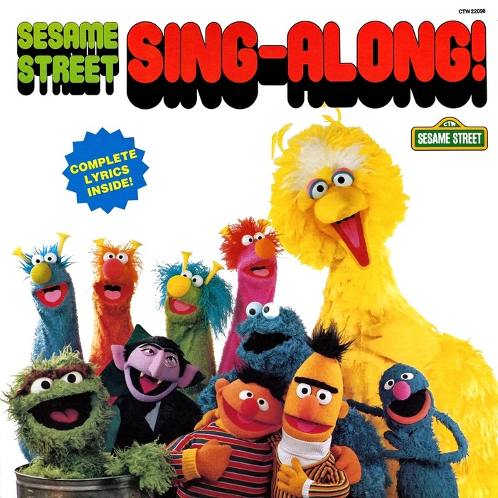 Sesame Street Sing-Along! (Sesame Street Records, 1982) [More info on Discogs] “Complete Lyrics Inside!” is in Helvetica.