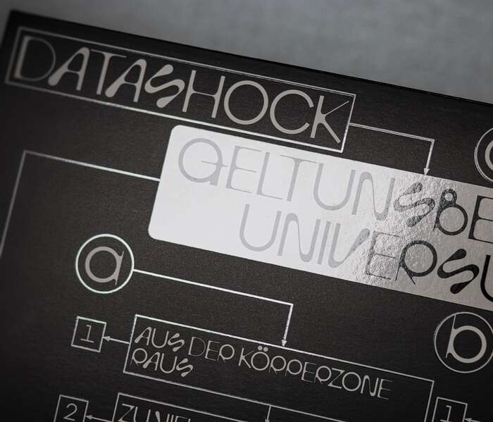 On the back cover, diagram elements are finished with UV spot varnish