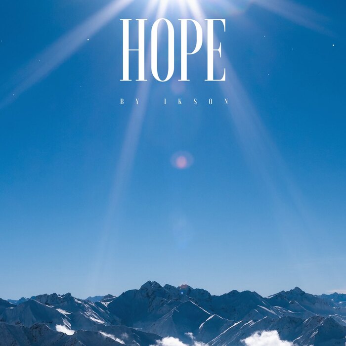 The cover for “Hope” (April 2021) depicts the blue sky over some mountains, with some sunrays embracing the title.