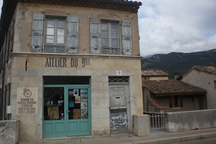 The shopfront with the Vercors massif as a backdrop