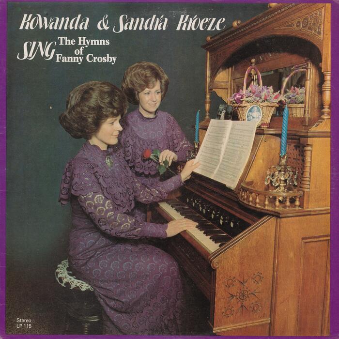 Kowanda &amp; Sandra Kroeze – Sing the Hymns of Fanny Crosby. Photo by Yeun Lui Studios. [More info on Discogs] From the back cover: “The organ used in the front cover picture is an antique owned by the 97-year old grandmother of Billy and Johnny Kroeze.” The accompanying serif looks like a bold variety of .