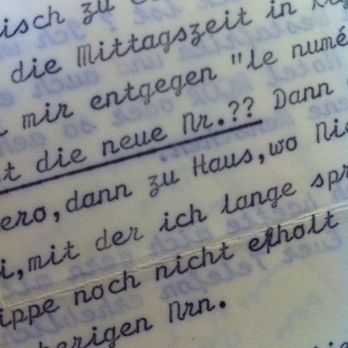 Compared to this typewritten sample of , Rigaud smoothed out the connections and closed some of the gaps: pairs like “Nr” and “ic” join up, while others like “Mi” and “ro” maintain the artefacts caused by the technical limitations of the original.