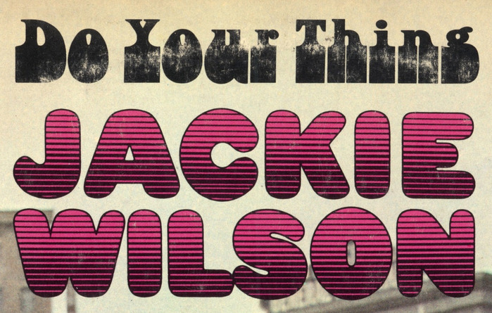 Close-up of the title typography. The bottom-heavy  is used with widened proportions while the striped caps of  A were squeezed.
