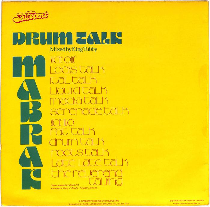 Back cover with the band name in stacked caps from Motter Ombra. The King Tubby credit is added in . Small print features the Selectric version of .