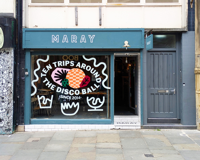 “Ten Trips Around the Disco Ball” window painting for Maray 2