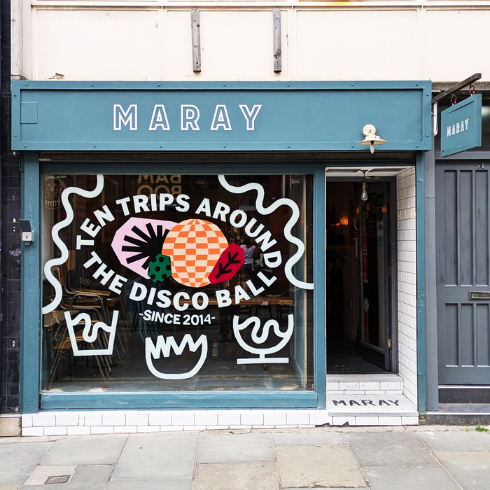 “Ten Trips Around the Disco Ball” window painting for Maray 1