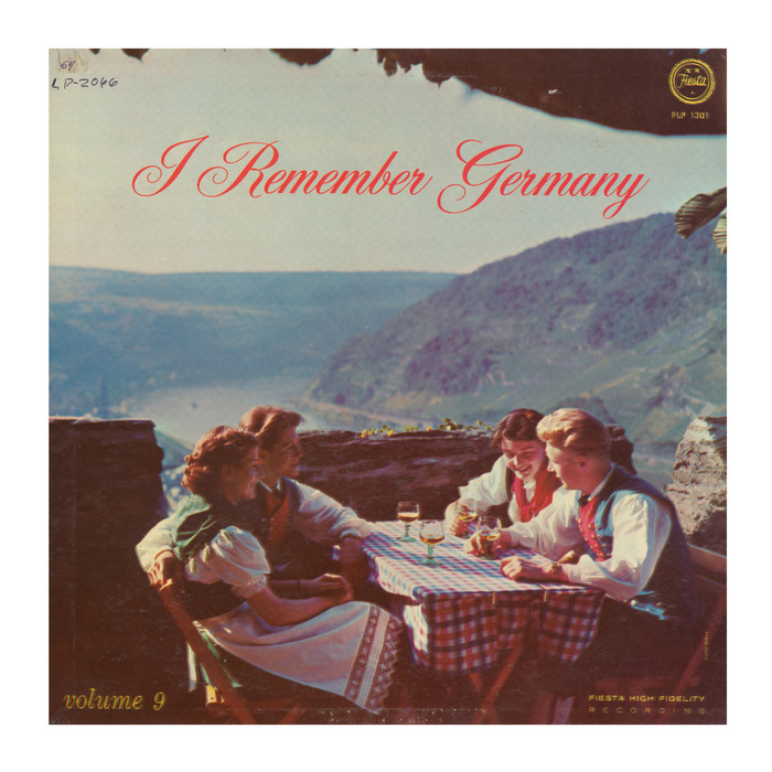 On the cover of vol. 9, we get to see young folks in traditional costume, drinking wine somewhere above the Rhine. The script is . [More info on Discogs]