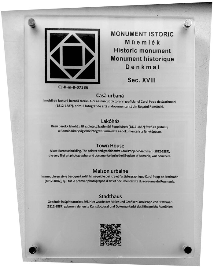 For reference: the official design of the monument information boards in the city of Cluj, using  and . Digital print on transparent acrylic panel, approx. 35×45 cm