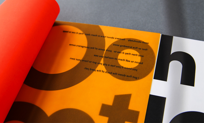 Besides functioning as dividing pages, the orange sheets added to the aesthetic quality of the book, creating unexpected typographic forms.