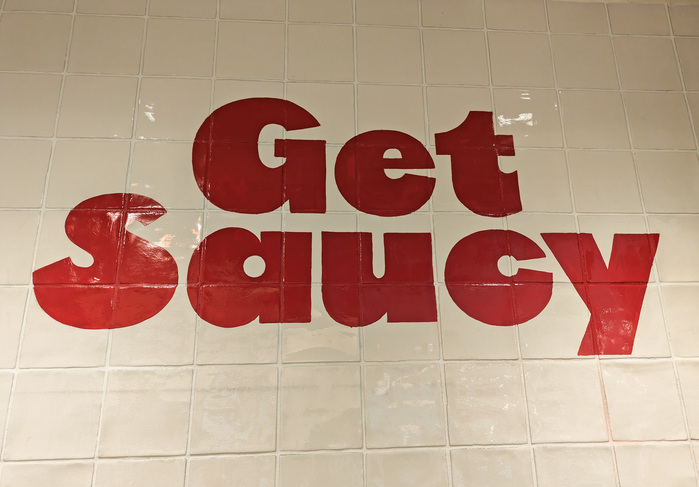 Hand-lettered Dug painted in the store’s interior.