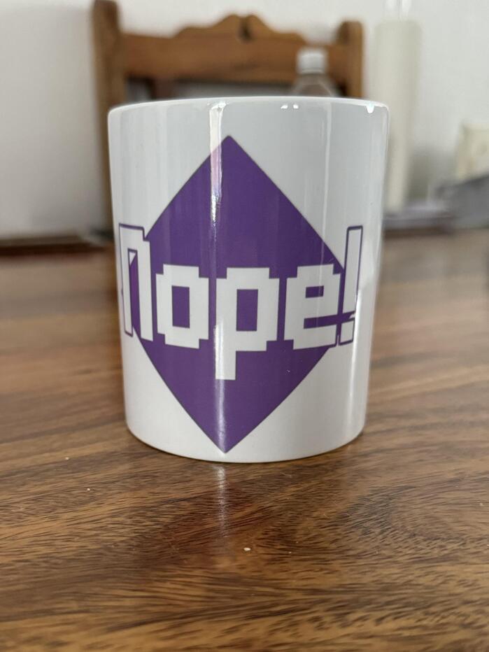 m6x11 on a Balatro mug