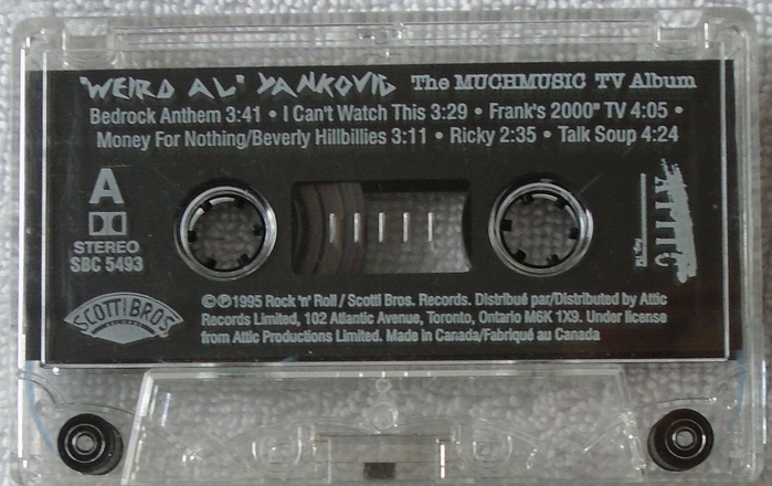 The cassette version of the Canadian version uses Beeswax for “‘WEIRD AL’ YANKOVIC” and  for track names and credits.