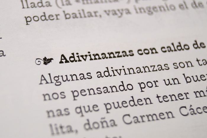 Note the fleuron, part of Violeta glyph set, which represents the vine leaf.