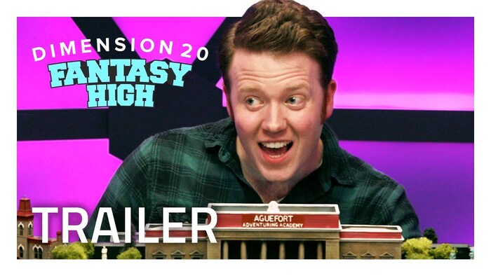 YouTube thumbnail of the trailer for Dimension 20 Fantasy High season 1, featuring Brennan Lee Mulligan, and the Fantasy High logo without its usually seen glow effects