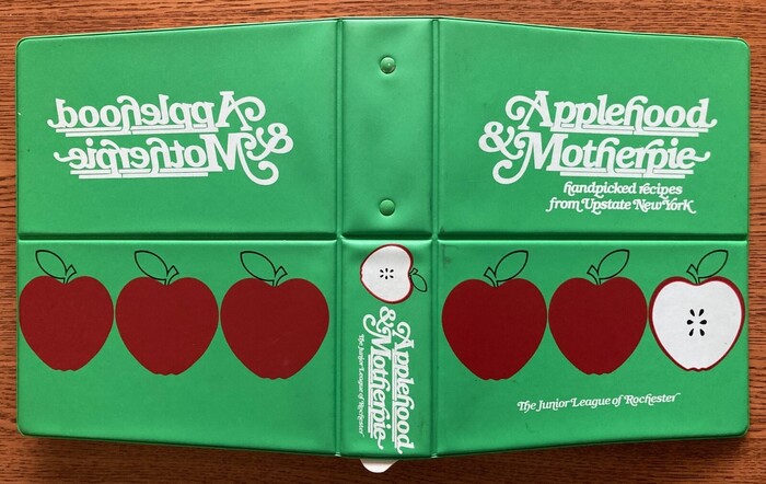 The Rochester area is a large producer of apples, thus the title and motif (and numerous recipes featuring the fruit).
