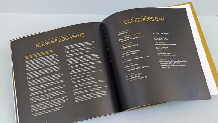 Double-page spread with a black background