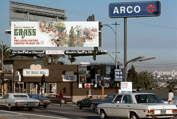 A billboard on Sunset Strip, advertising the release of the album in 1971. Coincidentally, the Music Hall sign below uses a stylistically related typeface, .