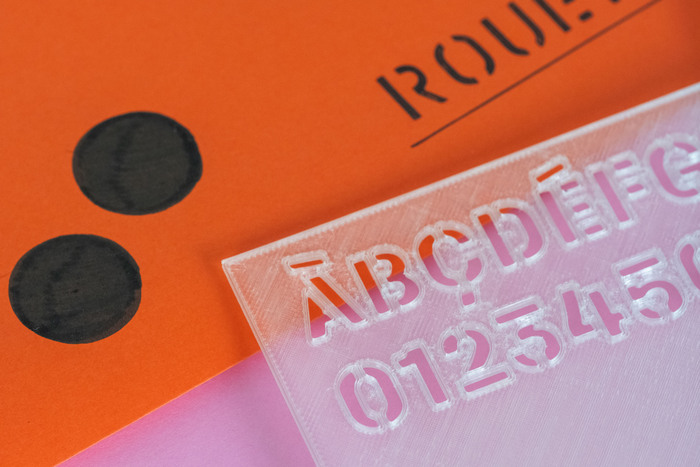 Studio Asensò created a Normograph-like lettering guide for Halvar Stencil as well as stencils so that they could reuse it as tools.