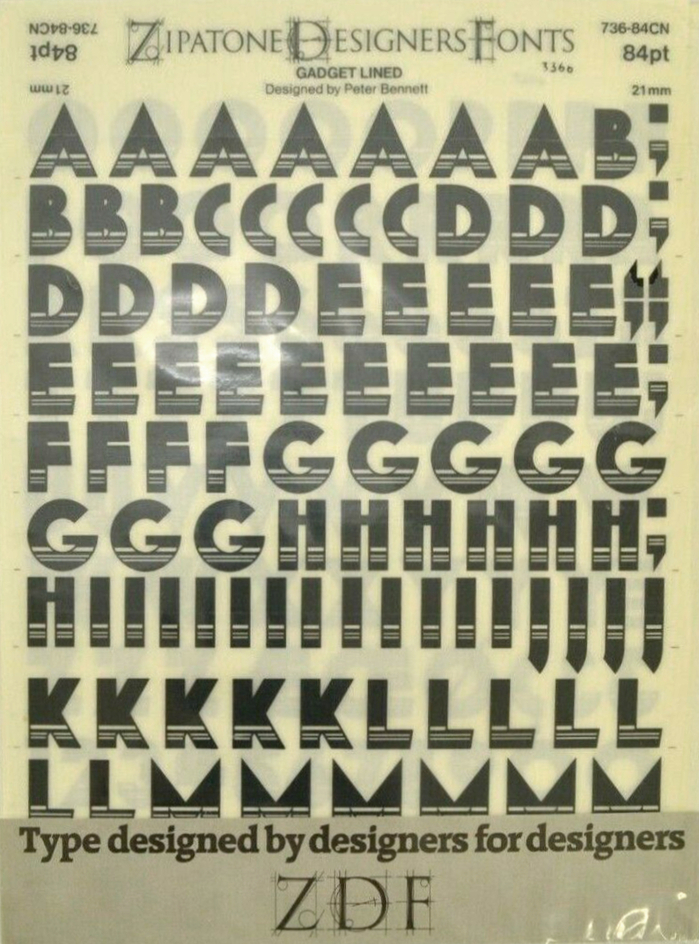 The striped variant, Gadget Lined, was also produced by  competitor  for dry transfer lettering. This sheet from their Zipatone Designers Fonts (ZDF) range has caps in 84pt. Thanks to this adaptation, we know that Gadget is the design of .
