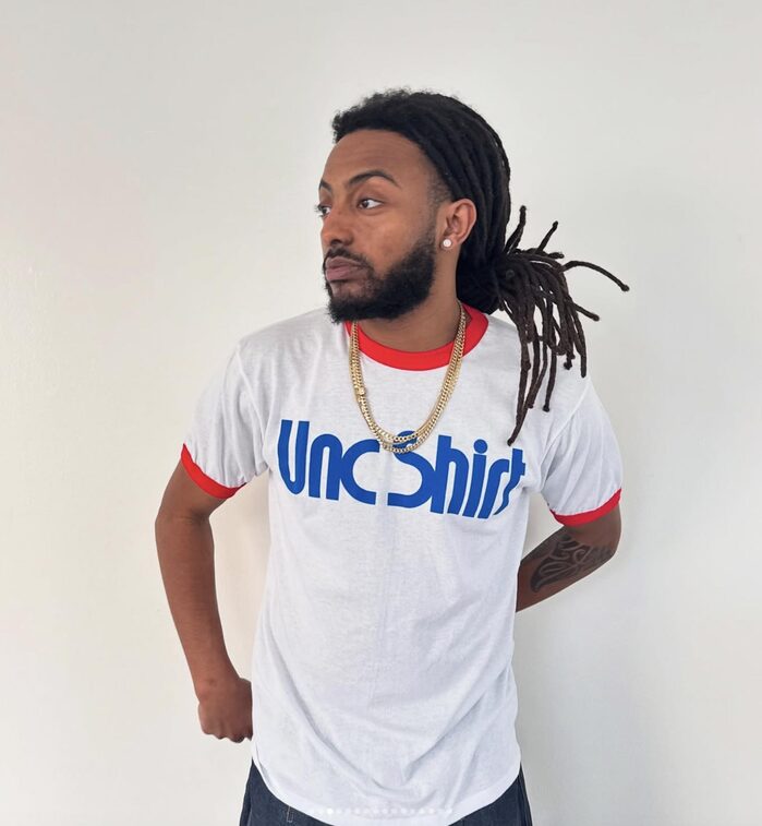 Aminé wearing the Unc Ringer.