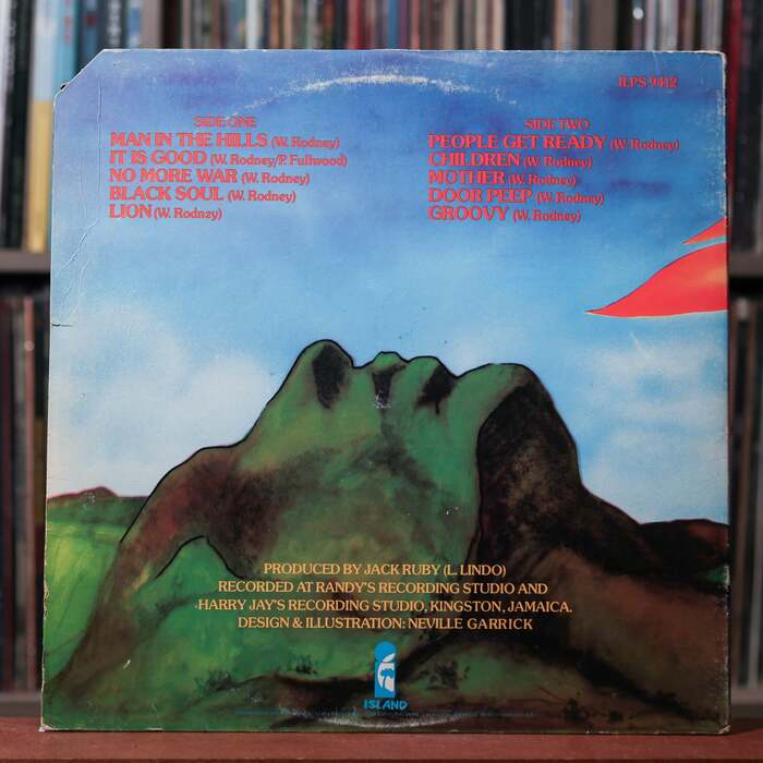 Song names and credits on the back cover are set in , mostly in all caps.