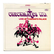 The Checkmates Ltd. – <cite>Live! At Caesar’s Palace</cite> album art