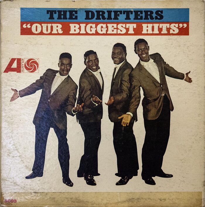 Front cover for Our Biggest Hits. “THE DRIFTERS” and “‘OUR BIGGEST HITS’” are set in Egyptienne Bold Condensed (width stretched to 133%).