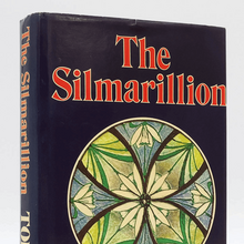 <cite>The Silmarillion</cite> by <span>J.R.R. Tolkien</span>