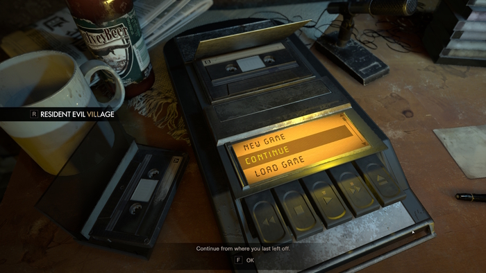 Main menu. The player navigates the menu using a tape recorder that uses Digital for the UI.