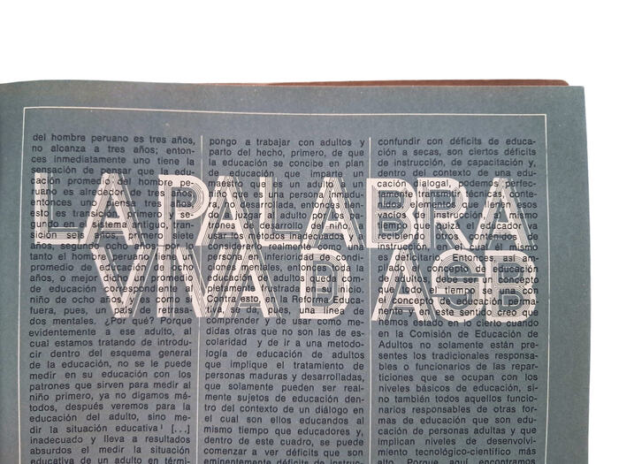 Text in  is printed on top of the title in reversed caps from 