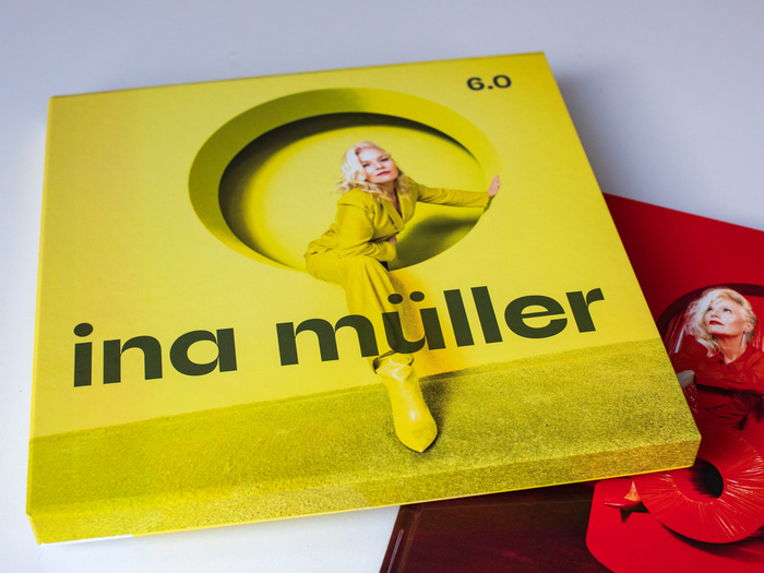 The limited collector’s edition of 6.0 includes a 40-page photo book with a CD and two vinyl records enclosed in a yellow slipcase – numbered and autographed.