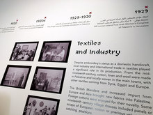 <cite>At The Seams</cite> exhibition