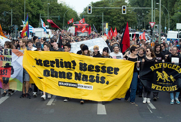 “Berlin? Besser ohne Nazis” (Berlin? Better without Nazis) — banner shown by counter-demonstrators at Nazi rally on 7 May 2016 in Berlin.