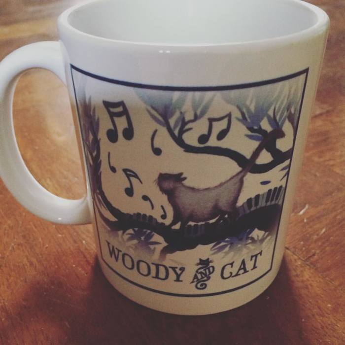 The Woody & Cat coffee mug features Salmiak, too.