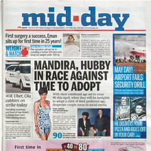 <cite>Mid Day</cite>