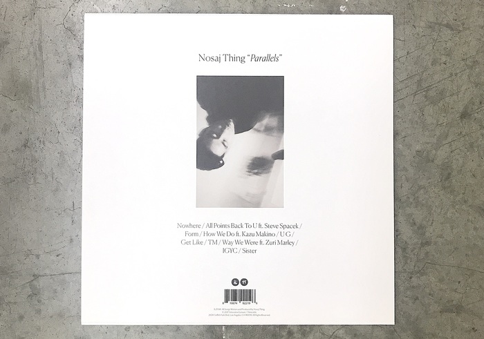 The back cover with the track listing is set in Canela Thin.