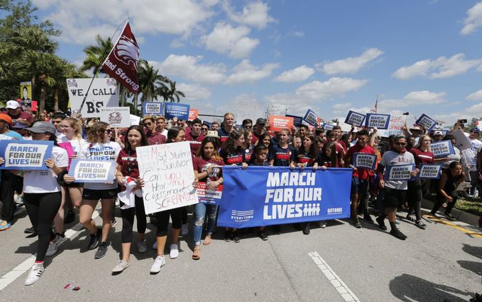 Marjory Stoneman Douglas High School students take part in a “March For Our Lives” rally in Parkland, Fla.