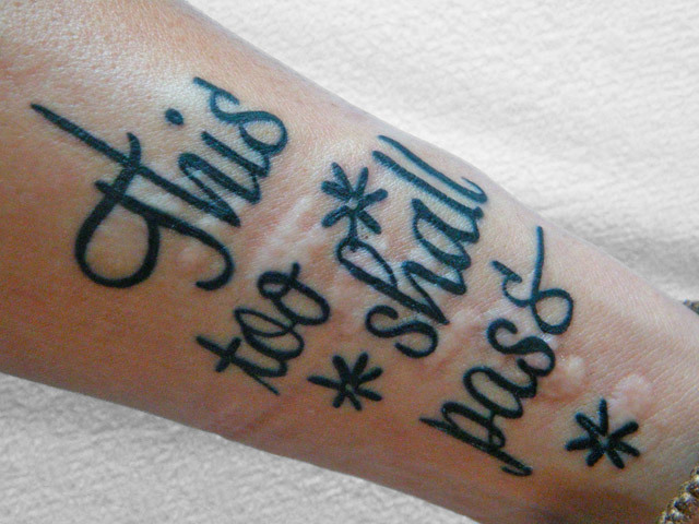 This too shall pass lettering tattoo located on the