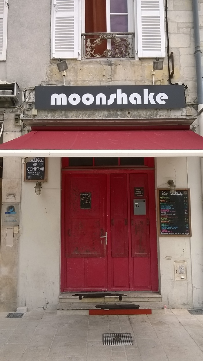 The sign for the Moonshake Bar is in white lowercase letters from Blippo Black (1969).