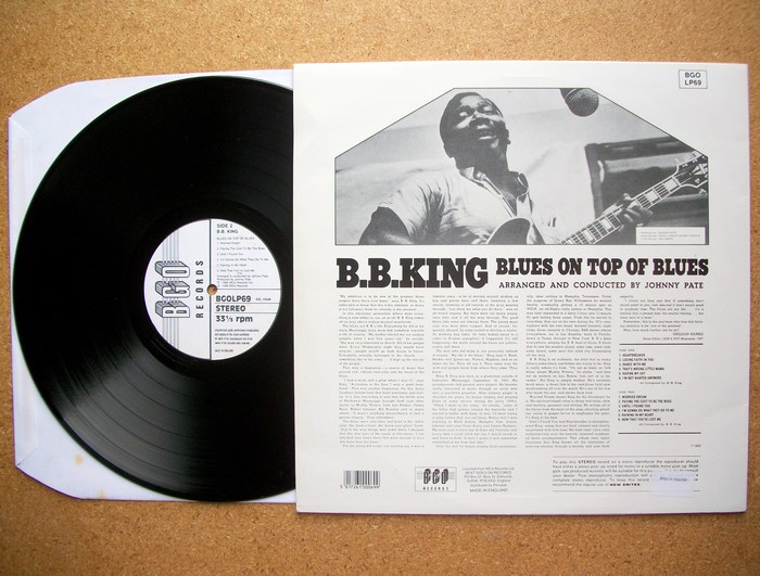 The back cover features a number of other, less heavy slab serifs. “B.B. King” is Bartuska Breton. “Arranged and conducted” is set in Beton. The text typeface used for the liner notes appears to be a version of Stymie with its alternate monocular ‘a’.