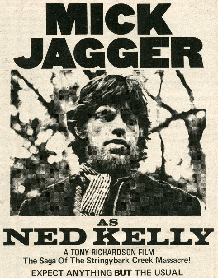 Advertisement with the same lettering used for “Mick Jagger” and a better view of the rare sight that is Jagger with a beard; movie title set in Volta Bold, credits and blurb set in Univers.