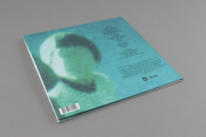 Back cover of the 2004 re-release in digipak format