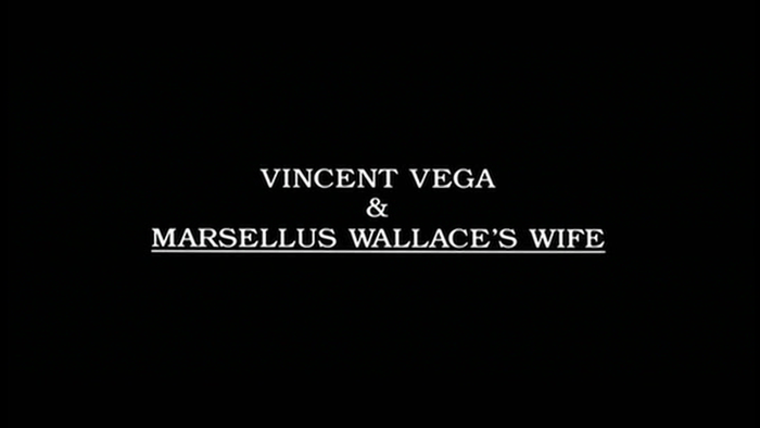 Intertitle card, partially underlined: “Vincent Vega & Marsellus Wallace’s Wife”