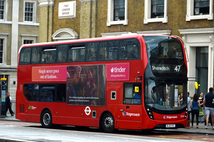 Tinder ad on a double decker bus in London.