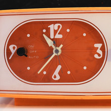 Sears solid state clock radio in orange